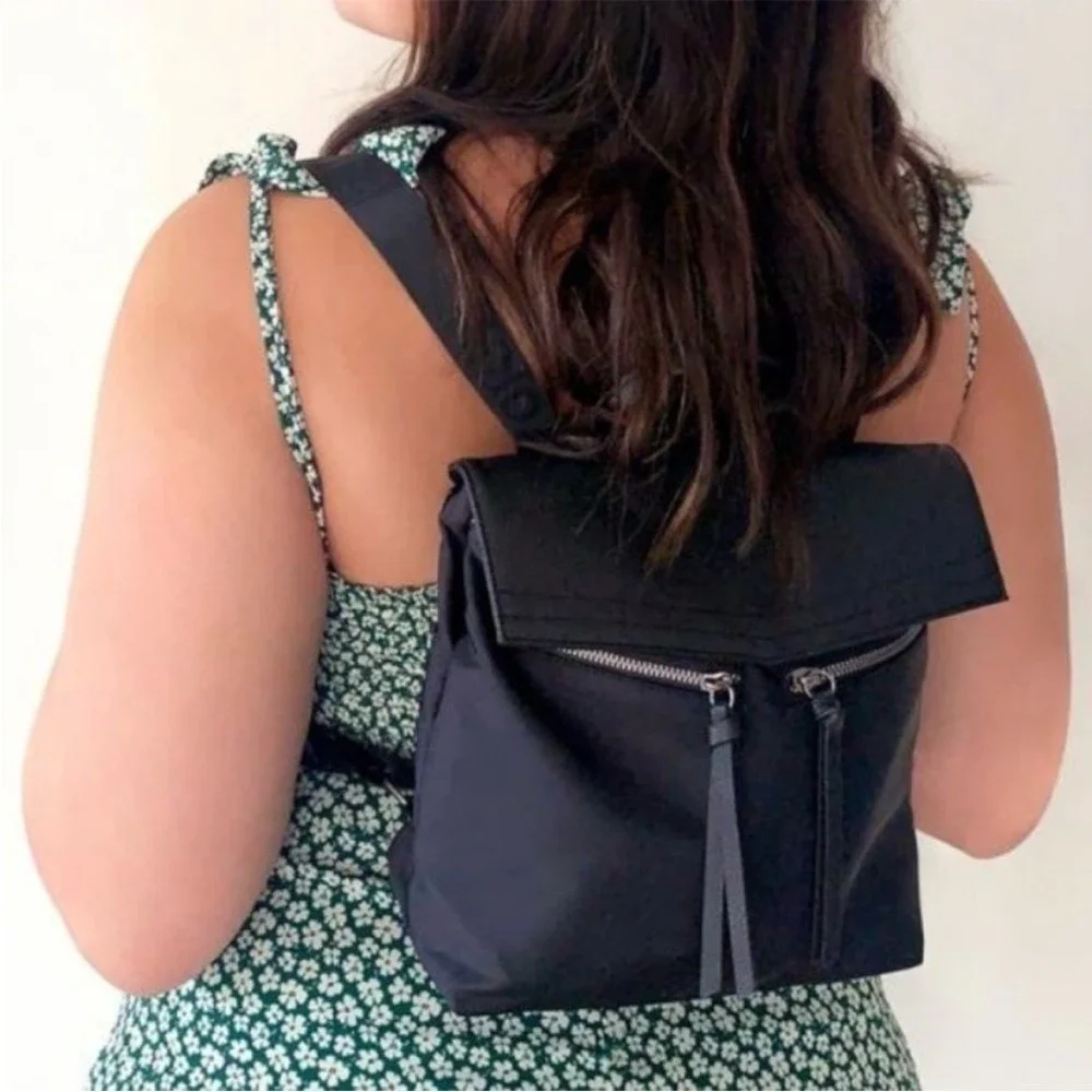 Botkier | Sleek Black‎ Mini Backpack Adjustable Branded Straps Tassel Pockets